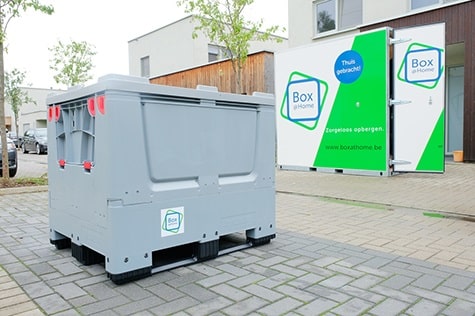 A Small Box standing outside with a Medium Box in the background