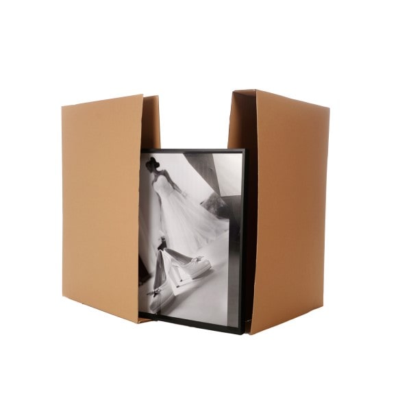 A cardboard box for storing paintings